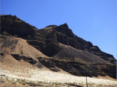 The Beverly Dunes in the Yakima River Canyon show the cliffs carved by the flood with sand dunes deposited by the flood at the bottom